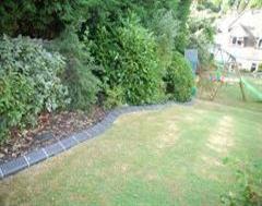 A Quality Edging on a Very Sloping Garden